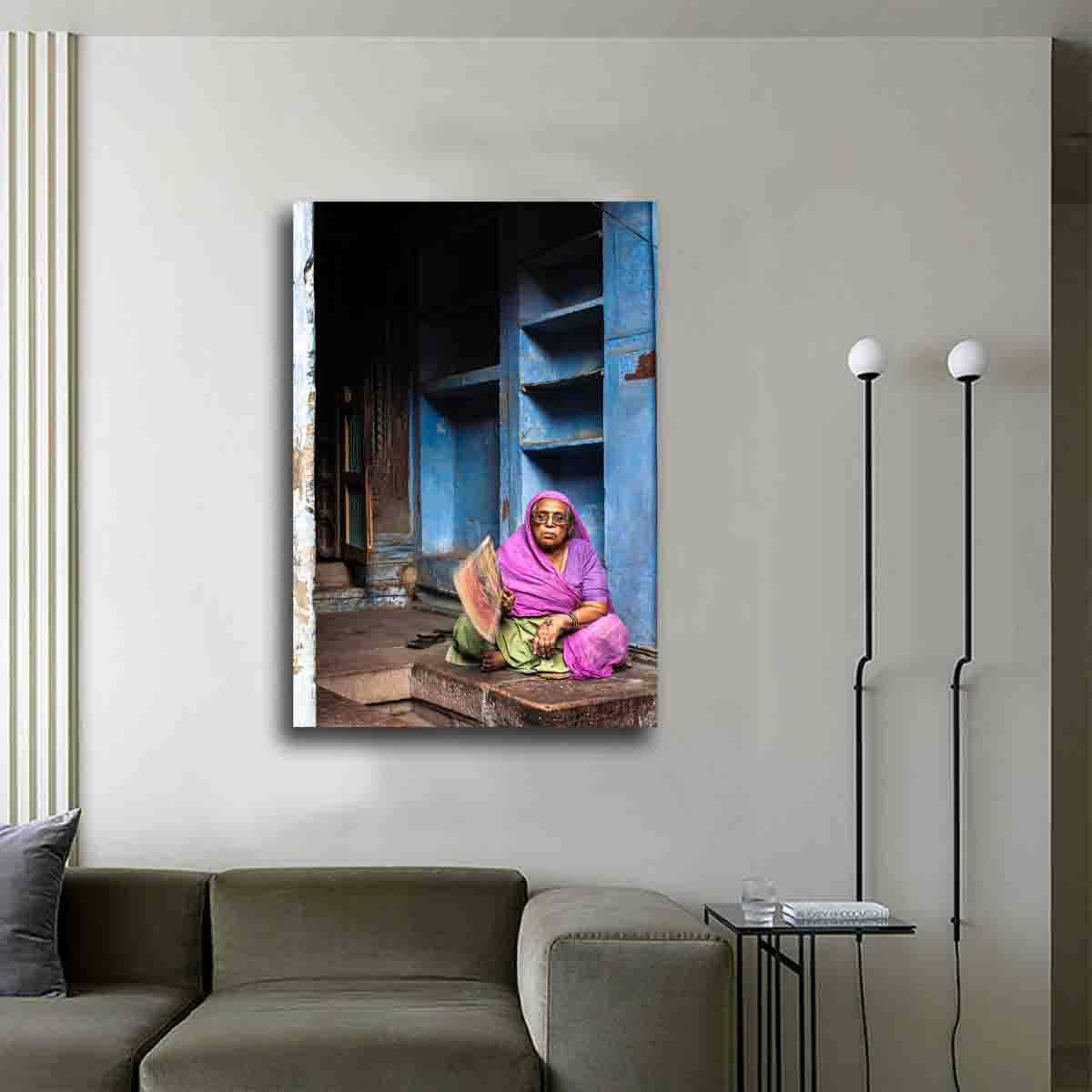 Echoes of Jodhpur Indian fine art print on wall, featuring blue city architecture and cultural details in a modern interior setting.