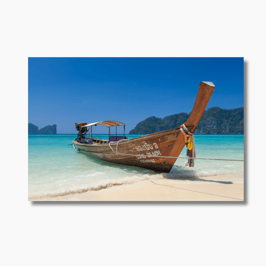 Island Solace – Limited edition tropical island photography print of Koh Phi Phi, Thailand, featuring tranquil water and lush cliffs.