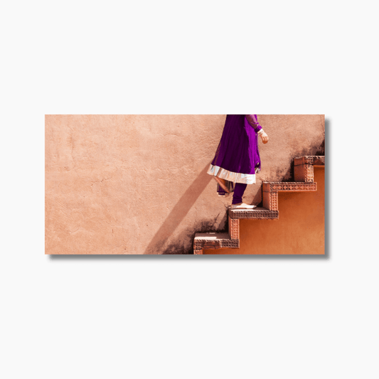 Woman in traditional Indian clothing climbing stairs in Agra — limited edition fine art wall photography print.