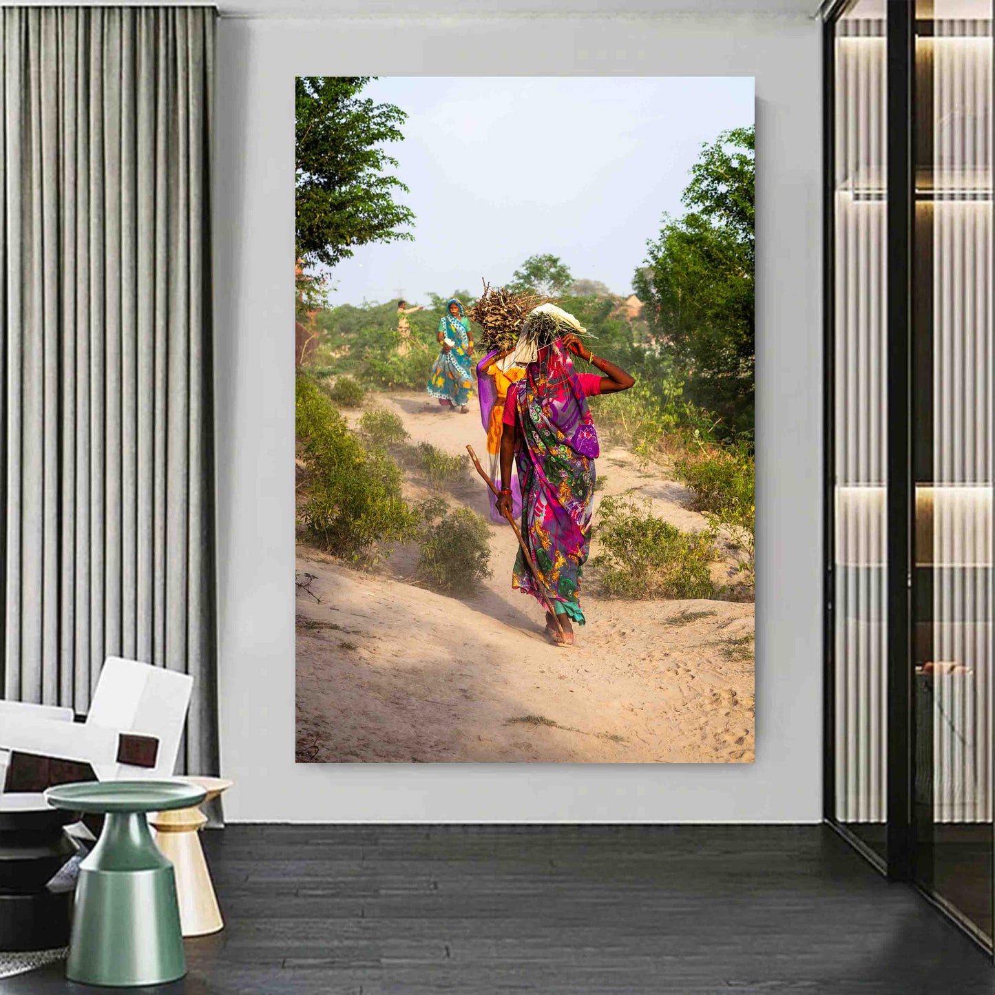 Agra India photography print of women in vibrant sarees walking outdoors, displayed in a modern, earthy interior.