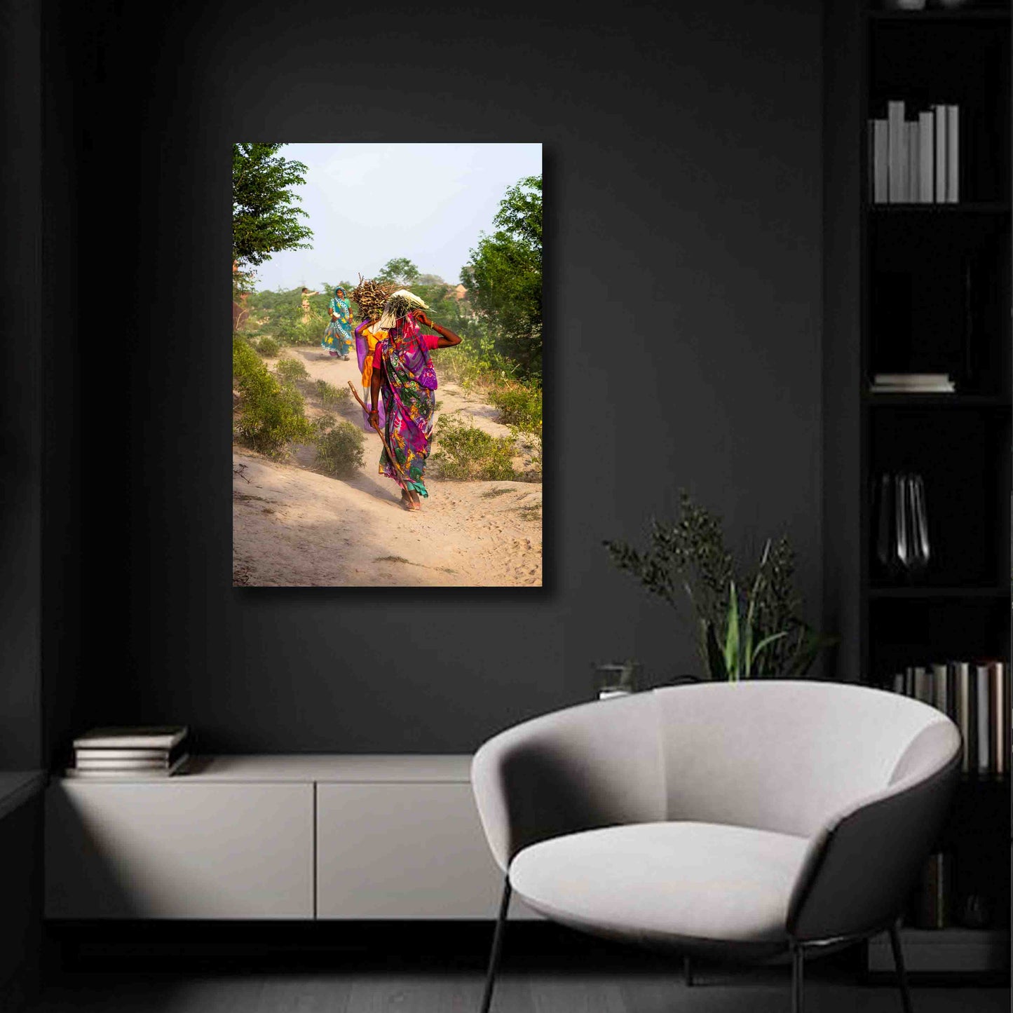 Agra India photography print of women in vibrant sarees walking outdoors, displayed in a modern, earthy interior.