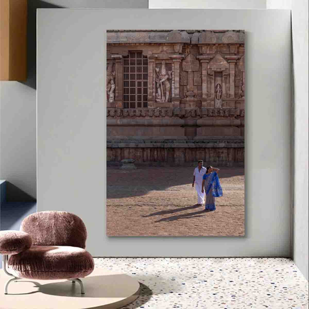 Photography print of a couple at Brihadisvara Temple displayed in a peaceful, romantic-inspired interior.