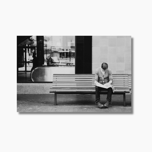 Person sitting alone outside Circular Quay Station in Sydney — limited edition urban street photography fine art wall print.