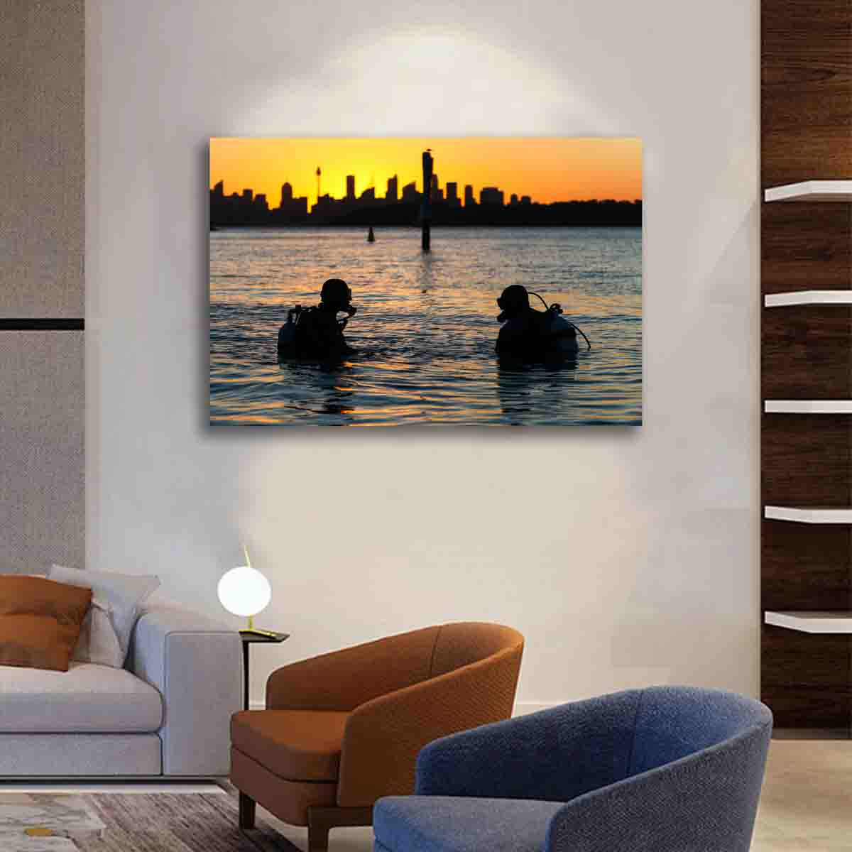 Sydney Harbour sunset photography print with divers and city skyline, displayed in a modern coastal-inspired interior.