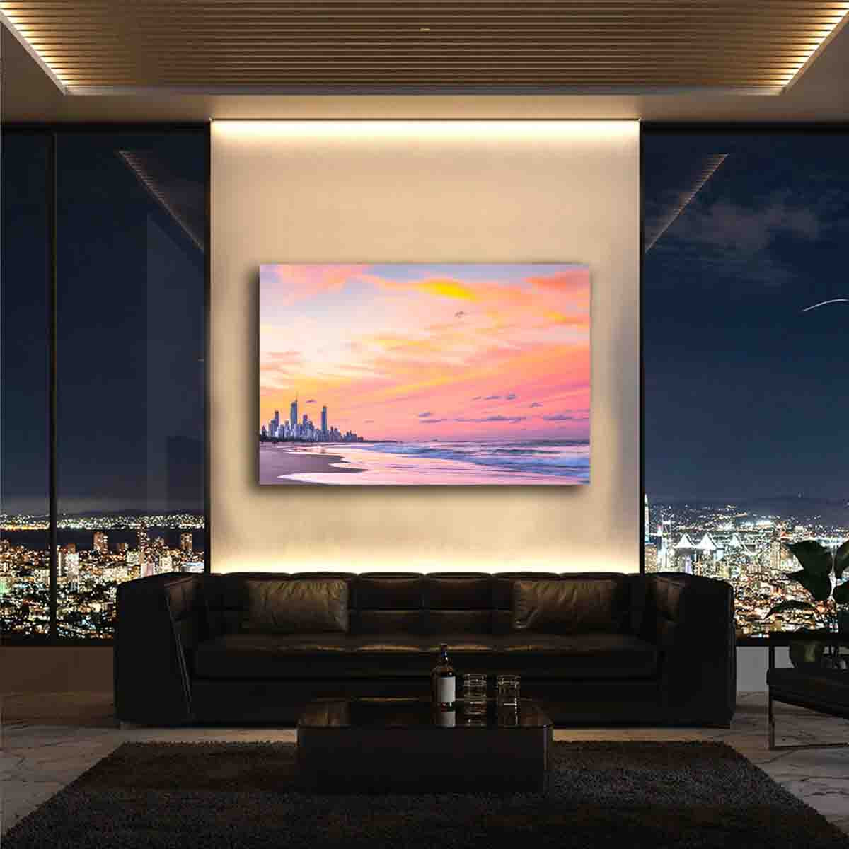 Limited edition Gold Coast coastal sunset wall art print displayed in a warm-toned modern interior with ocean-themed decor.