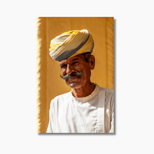 Portrait of an Indian elder taken inside Jodhpur Fort — limited edition cultural wall art with rich colours and textured fabric.
