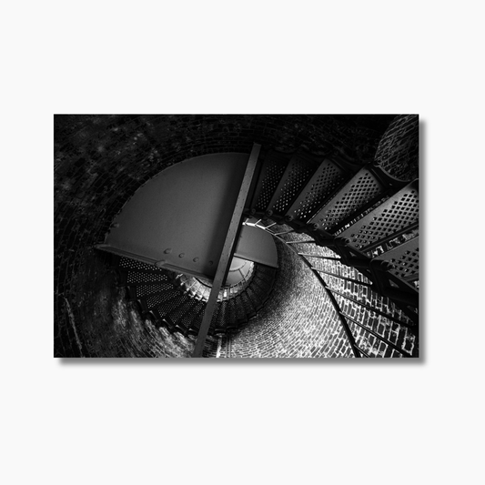 Spiral staircase inside an Oregon lighthouse viewed from above — limited edition architectural fine art wall print.