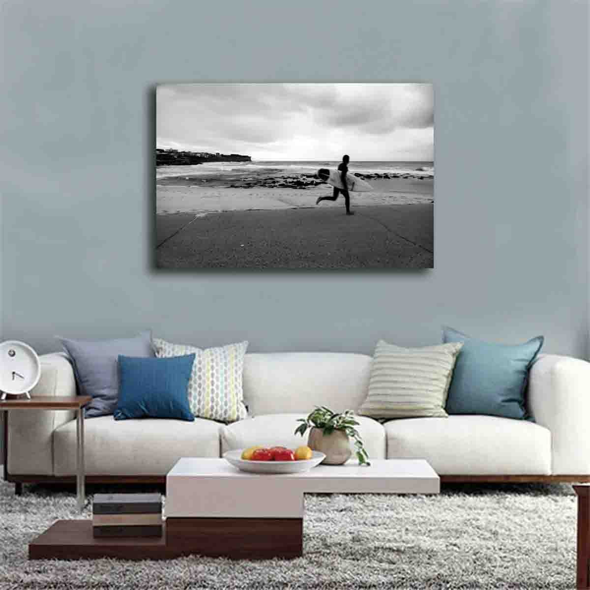 Bronte Beach sunrise surfer wall art print, displayed in a modern beach-inspired interior.