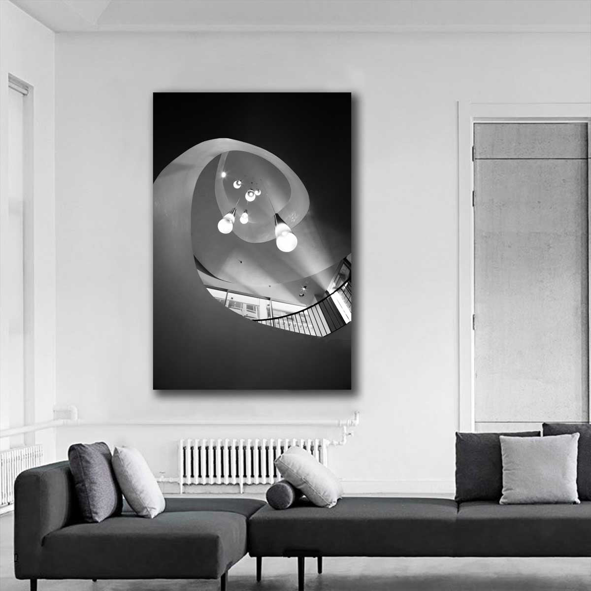 Sydney spiral staircase with pendant lights displayed in a modern architectural interior.