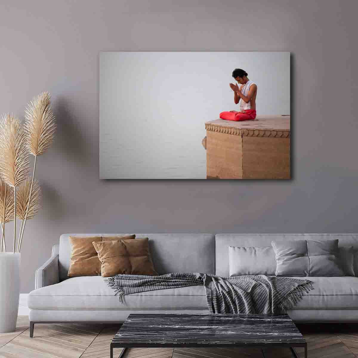 Varanasi ghat prayer photography wall art displayed in a calm, sacred-inspired interior.