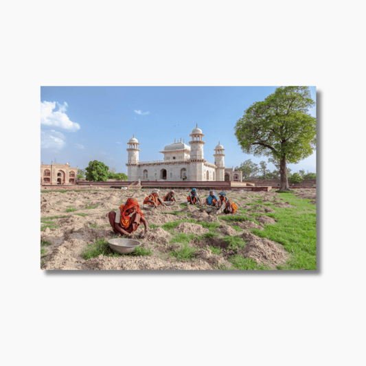 Indian women carrying stones in bowls on their heads outside the Baby Taj Mahal in Agra — limited edition cultural labour and travel photography print.