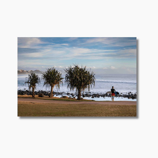Surfer standing beside three trees looking out at the ocean at Burleigh Heads, Gold Coast — limited edition fine art surf photography print.