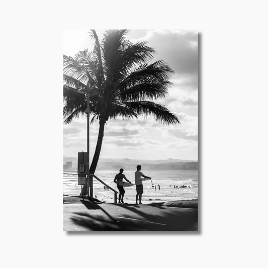 Two surfers at Snapper Rocks, Gold Coast, preparing to walk down to the beach with surfboards — limited edition Australian coastal photography print.