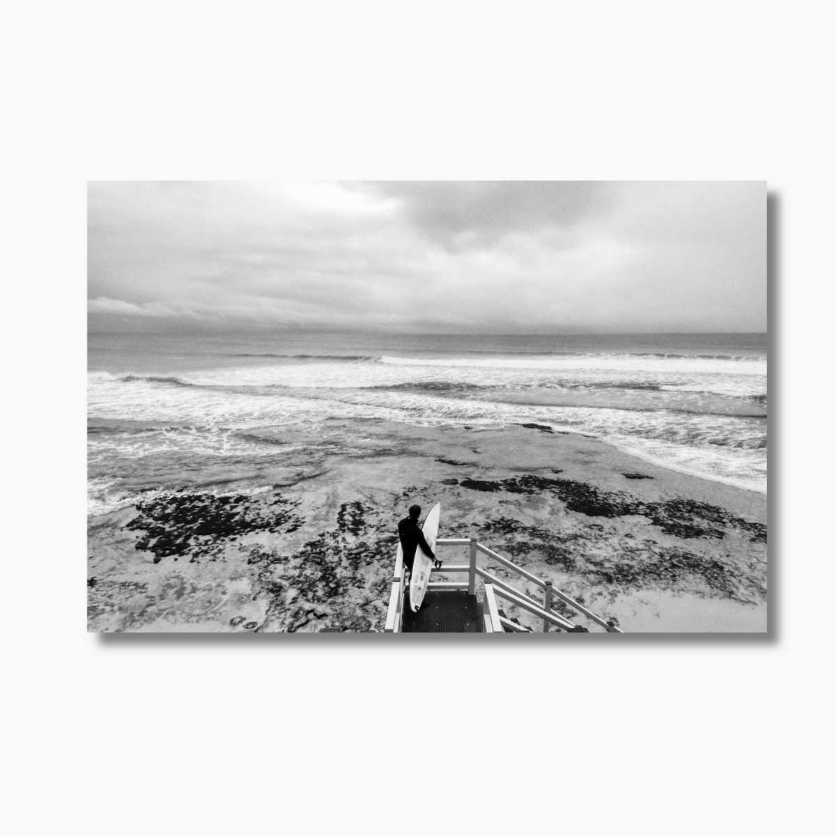 Surfer standing on the beach looking at the waves in Torquay, Victoria — limited edition Australian surf photography print.