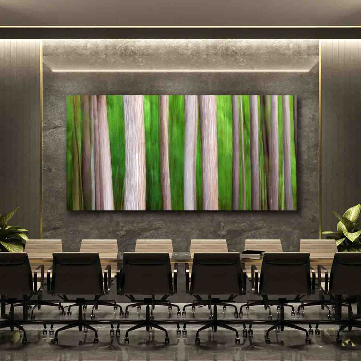 Nature-inspired abstract fine art print of vertical forest trees hanging in a modern minimalist interior.