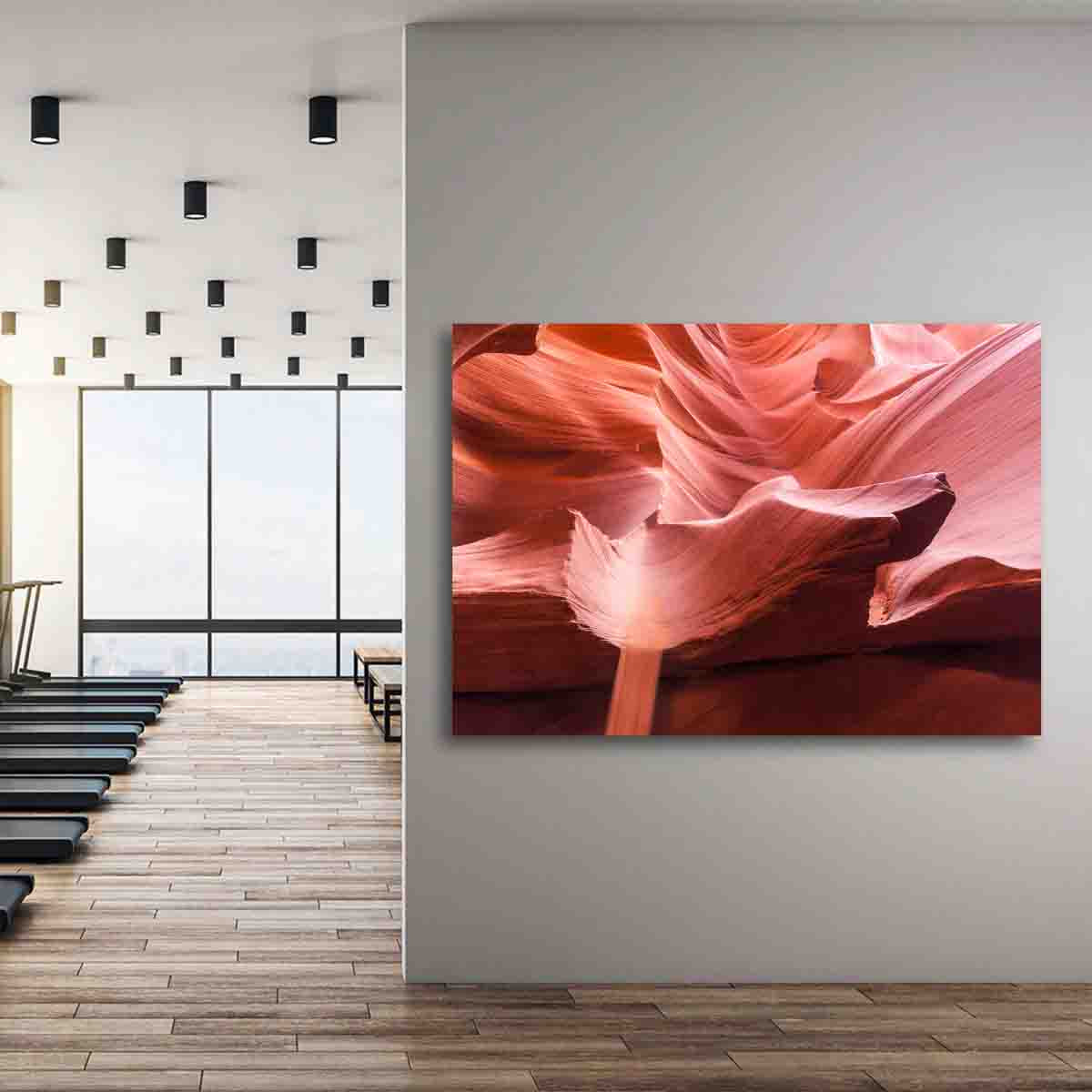 Framed Antelope Canyon wall art displayed in a minimalist living room with warm tones