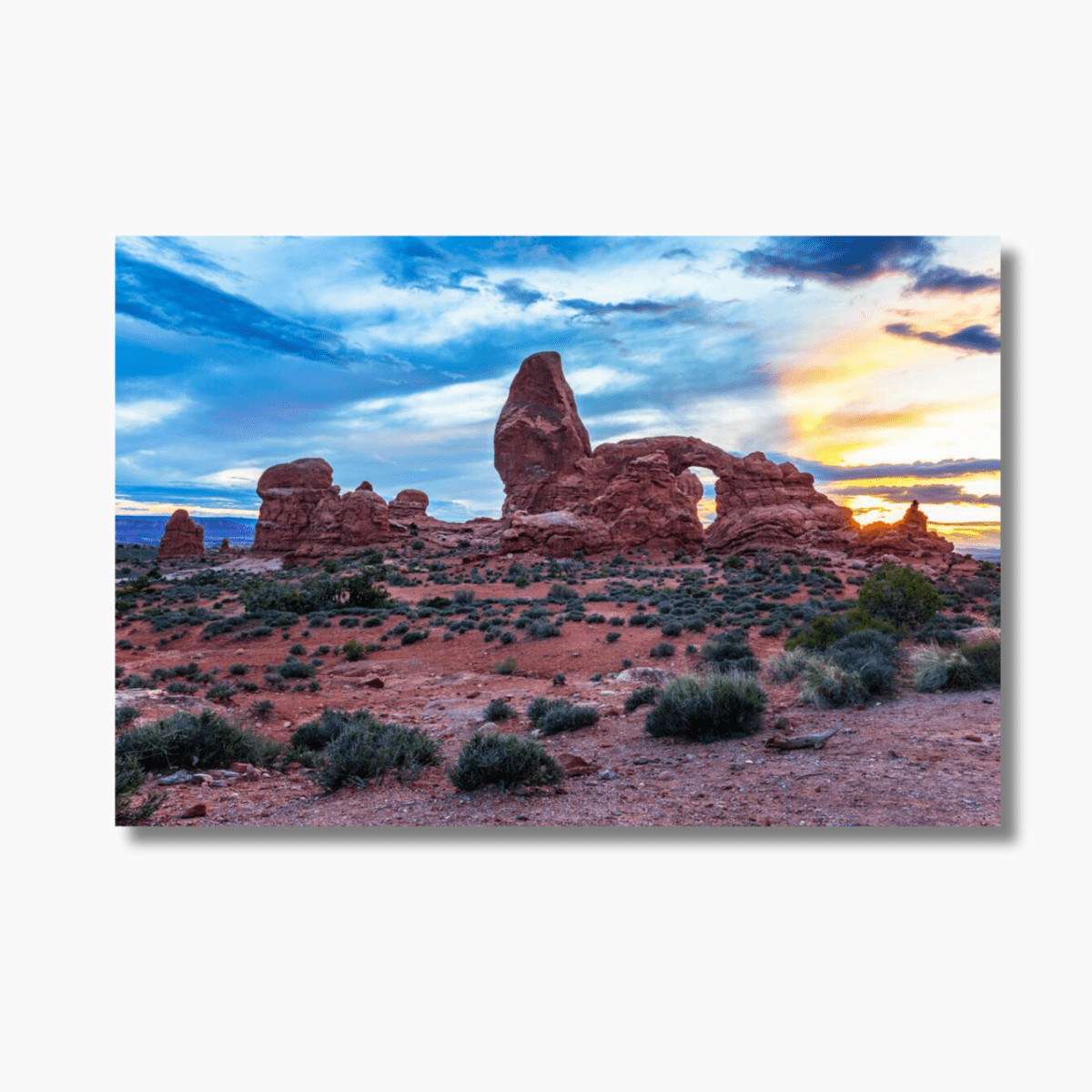 Golden light over sandstone arch in Arches National Park, Utah—limited edition desert photography wall art print.