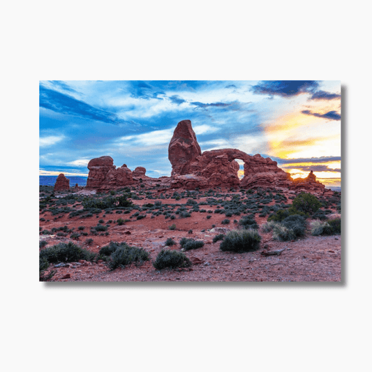 Golden light over sandstone arch in Arches National Park, Utah—limited edition desert photography wall art print.