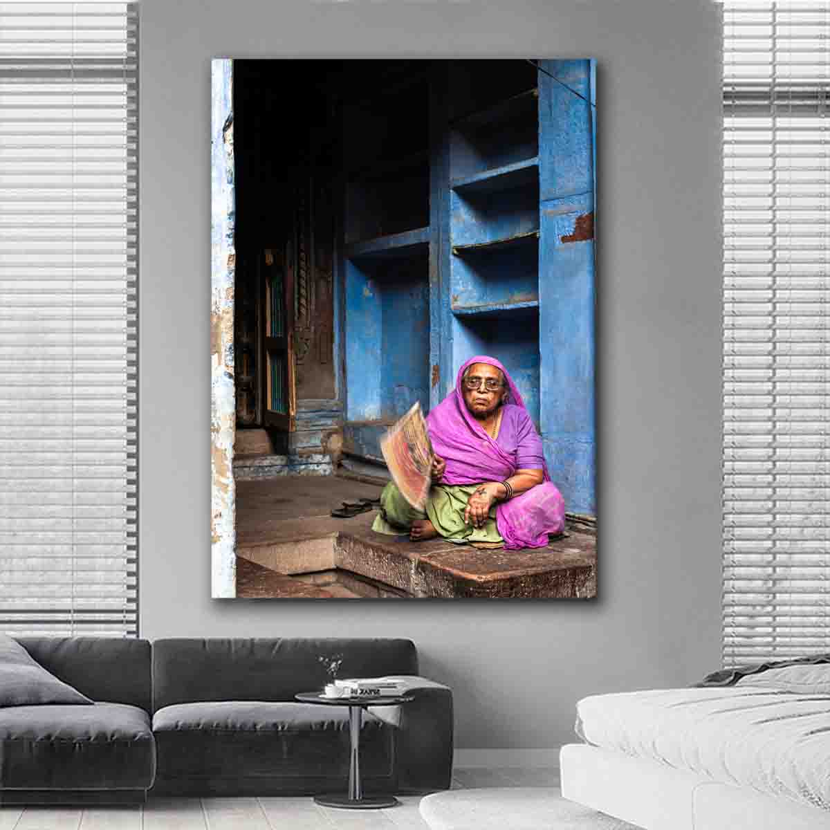 Echoes of Jodhpur Indian fine art print on wall, featuring blue city architecture and cultural details in a modern interior setting.