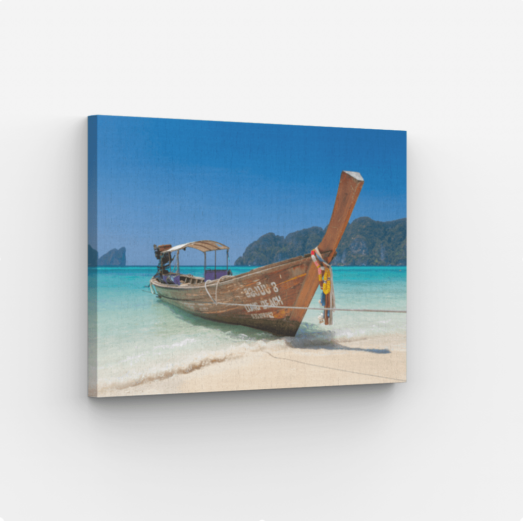 Island Solace – Limited edition tropical island photography print of Koh Phi Phi, Thailand, featuring tranquil water and lush cliffs.