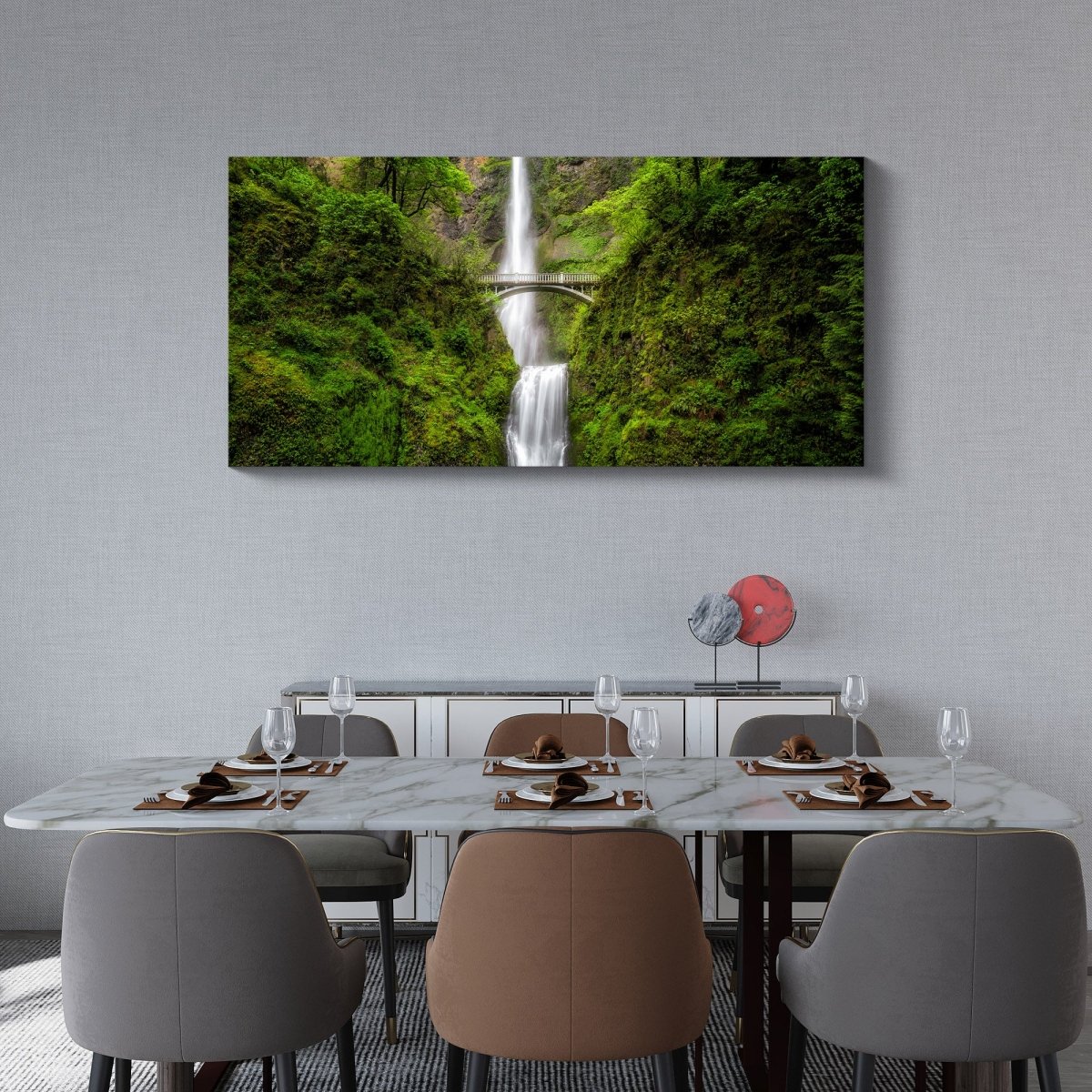 Limited edition waterfall wall art print of Multnomah Falls in a minimalist living room with neutral tones.