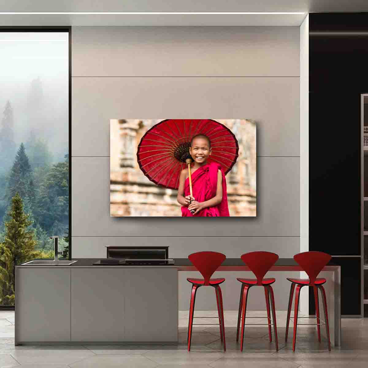 Fine art print of a novice monk standing in a Myanmar temple, displayed in a peaceful, modern interior space.