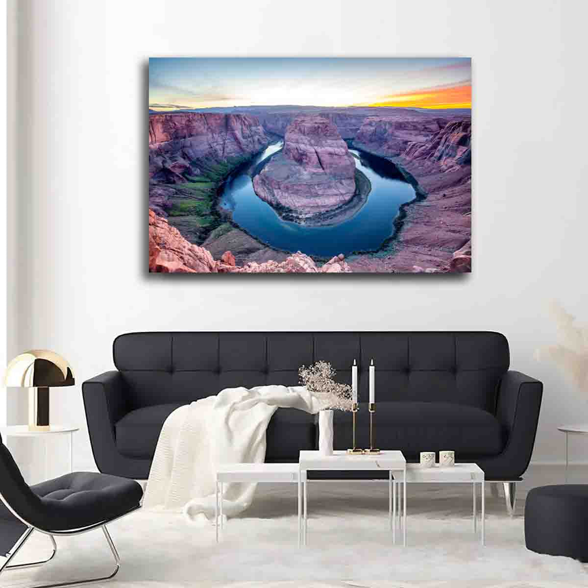 Limited edition fine art print of Horseshoe Bend at sunset displayed in a modern living room setting.