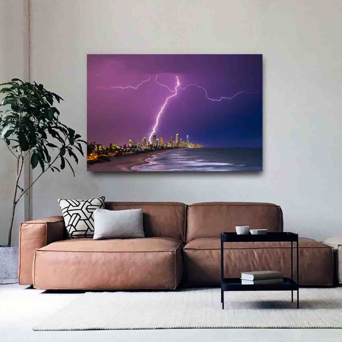 Cityscape wall art of Surfers Paradise skyline at night, displayed in a modern interior with coastal accents.