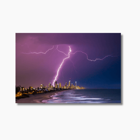 Surfers Paradise skyline at night, Gold Coast cityscape photograph with glowing skyscrapers and reflections.