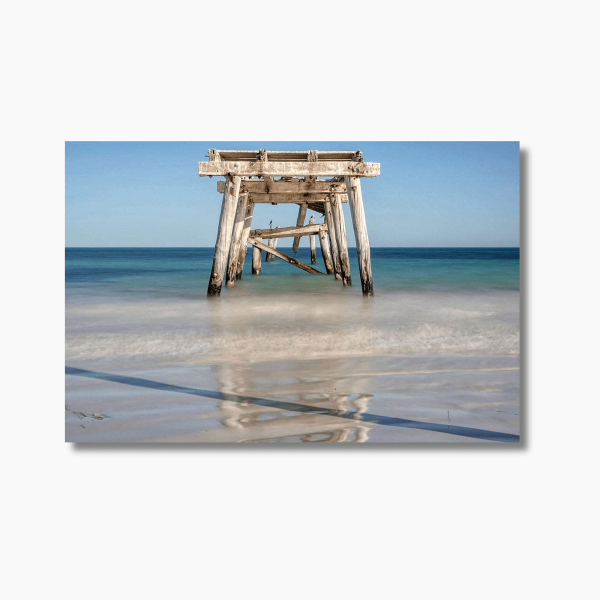 Photograph of the historic Eucla Jetty extending into the turquoise waters of Western Australia, captured as a limited edition coastal wall art print