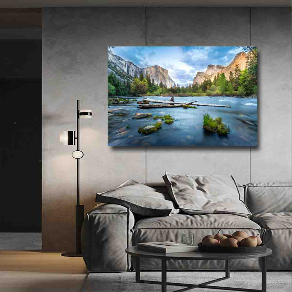 Fine art photography canvas wall art print of Yosemite Falls at sunset, styled in a minimal living room.