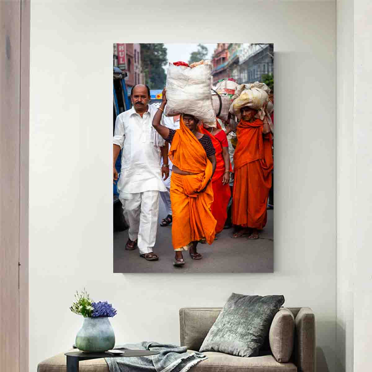 Burdens and Beliefs Indian cultural photography print displayed in a serene, globally styled interior space.