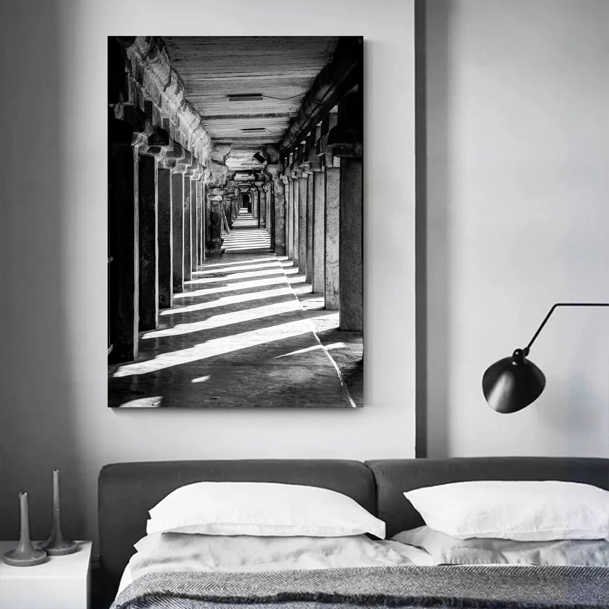 Photograph of stone beam corridor at Brihadisvara Temple displayed in a modern interior with neutral tones.