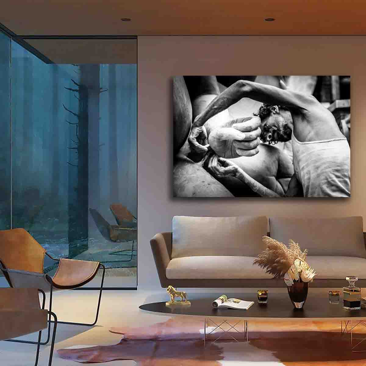 Fine art photo print of a sculptor shaping clay in Kolkata’s Kumartuli district, displayed in a serene, culturally inspired room.