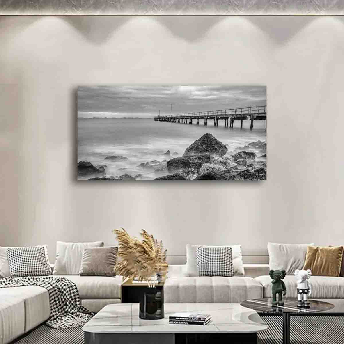 Monochrome ocean photograph by Dan Lewin, displayed as limited edition coastal wall art in a modern, minimalist interior.