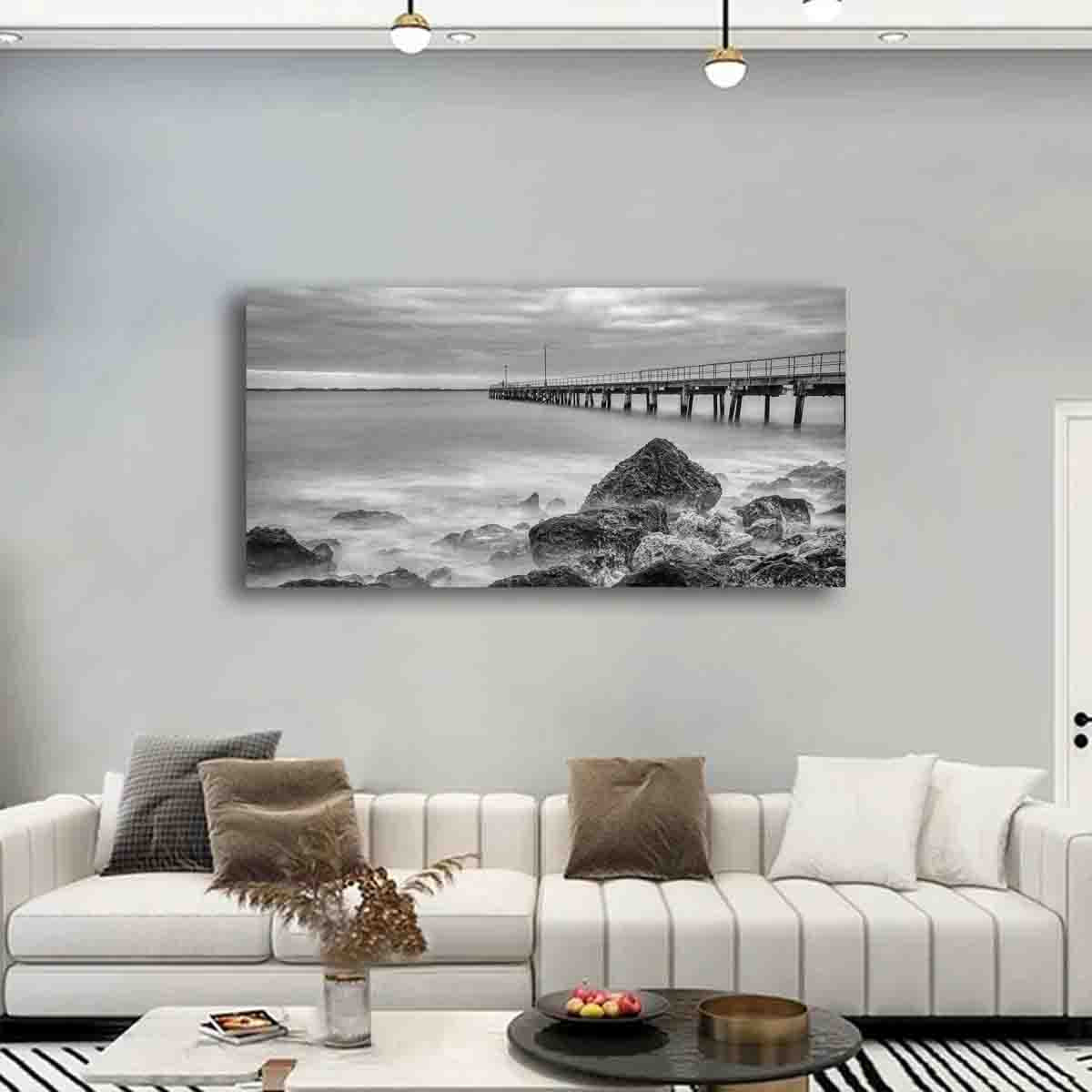 Monochrome ocean photograph by Dan Lewin, displayed as limited edition coastal wall art in a modern, minimalist interior.


