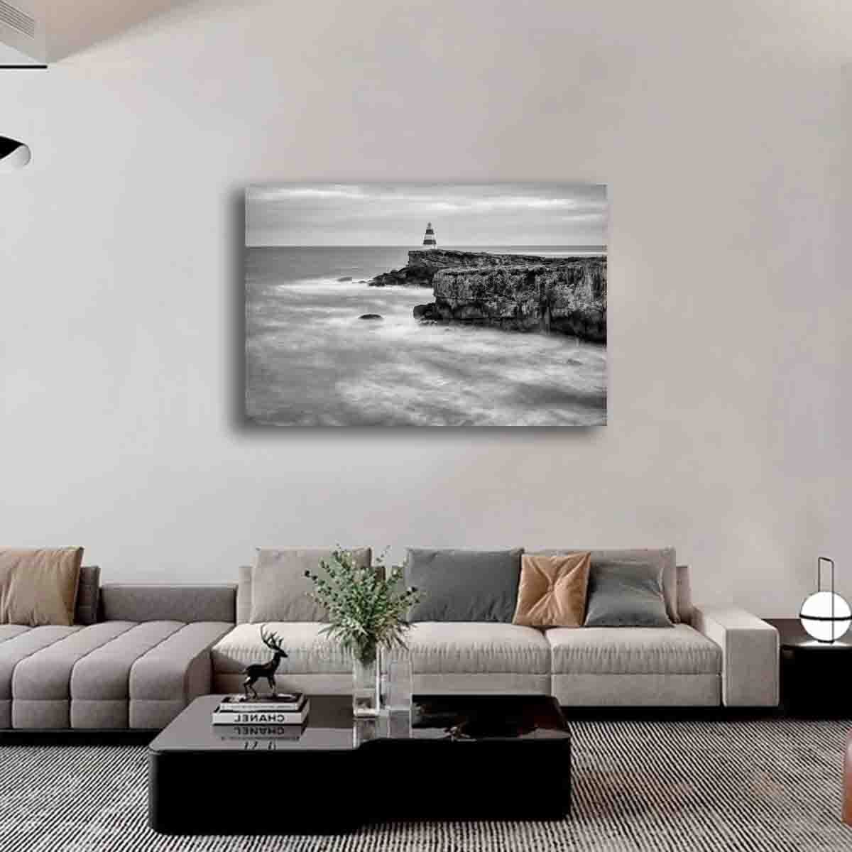 Guardian of the Tide fine art print by Dan Lewin displayed in a modern coastal interior with neutral tones and ocean-inspired styling.