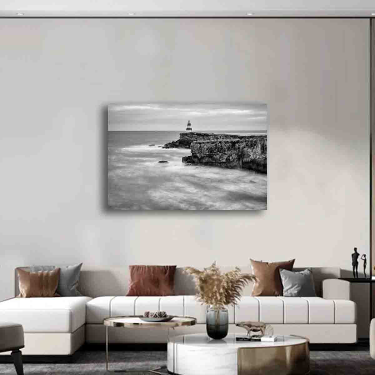 Guardian of the Tide fine art print by Dan Lewin displayed in a modern coastal interior with neutral tones and ocean-inspired styling.