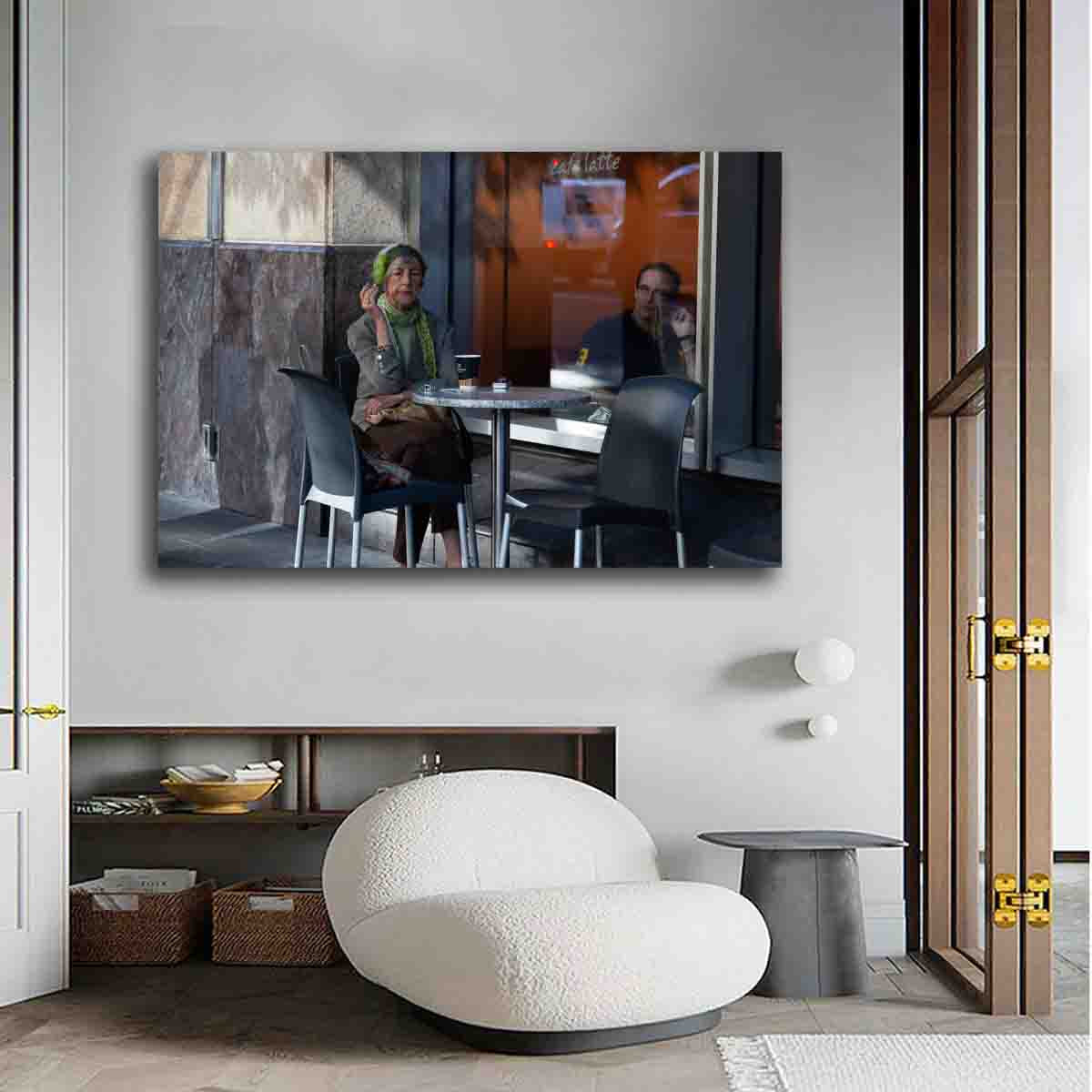 Sydney woman with coffee street photography print displayed in a soft-toned, contemplative interior setting.